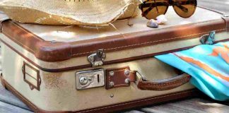 partenza vacanza valigia